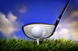 Golf club and ball in grass Golf club and ball in grass