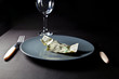 One dollar bill on a plate