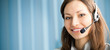 Portrait of happy smiling support phone operator in headset