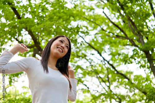Photo: beautiful asian woman in the forest beautiful asian woman in the forest