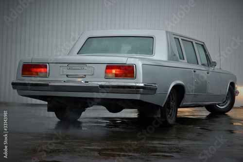 Foto Back View Of ZIL 115 Old Fashion Representative Car From USSR