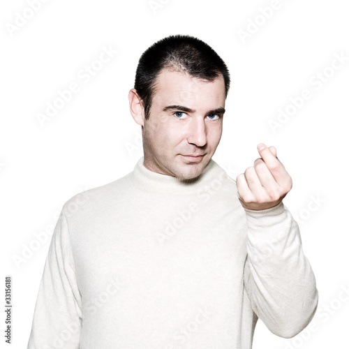Photo: Greedy man gesturing money sign Greedy man gesturing money sign