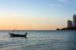 fisherman boat with a sunset