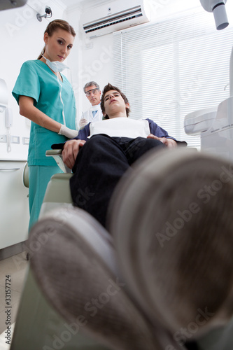 Photo: Boy in dentist's chair Boy in dentist's chair