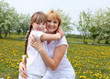 girl with mother in spring park