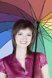 Photo: Beautiful woman with colorful umbrella Beautiful woman with colorful umbrella