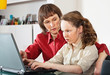 Mom and daughter with laptop