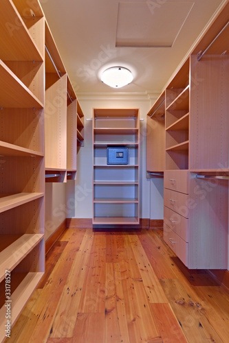 Photo: Large Empty walk-in closet with a safe Large Empty walk-in closet with a safe