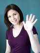 Photo: Young lady waving Young lady waving