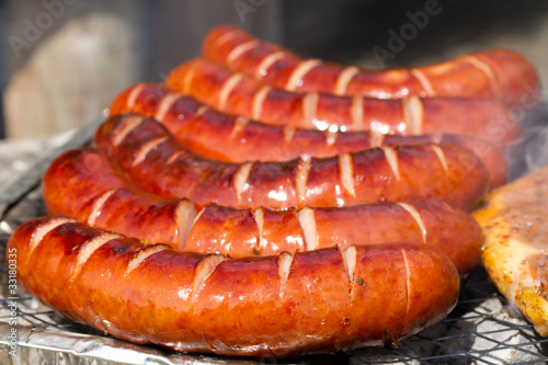 Photo: Grilled sausages on the barbecue Grilled sausages on the barbecue