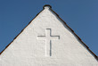 White cross on gable sky blue White cross on gable sky blue