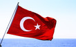 Image of Turkish flag over sea Image of Turkish flag over sea