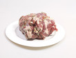 Stuffed lamb with rosemary, ham and garlic