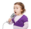 Little girl in violet sings intj the microphone.
