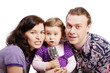 Mother, daughter and father sing into the microphone.