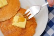 Eating pancake with fork
