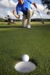 Ball rolling into the hole