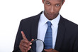 portrait of a man with magnifying glass