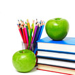 apple, books and colored pencil,