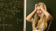Happy school girl on math classes finding solution Happy school girl on math classes finding solution