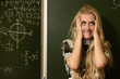 Happy school girl on math classes finding solution Happy school girl on math classes finding solution