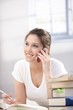 Young woman talking on mobile smiling