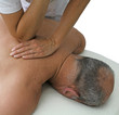 Therapist applying pressure to patients multifidus