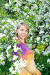 woman near the blooming tree woman near the blooming tree