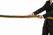 business man pulling rope