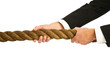businessman gripping rope