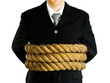 businessman tied with rope
