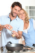 Husband cooking for wife