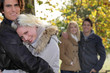 Couples strolling in the park together
