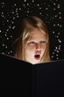 Young Girl Reading a Fantasy Book Young Girl Reading a Fantasy Book