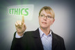 Woman Pushing Ethics Button on Interactive Touch Screen