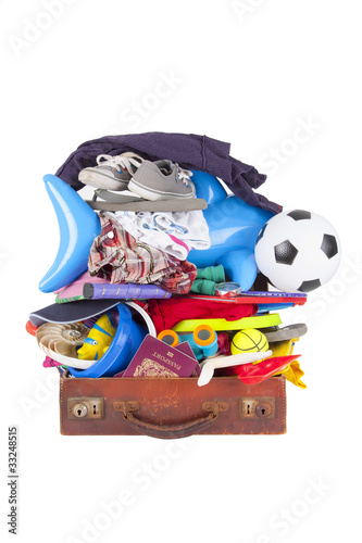 Photo: summer vacation or holiday suitcase really packed, cannot close summer vacation or holiday suitcase really packed, cannot close