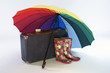 koffer schirm bunt stiefel