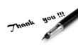 Thank you message and pen on white
