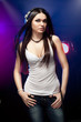 beautiful woman dj wearing headphones
