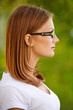 Woman in white blouse, profile