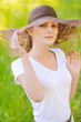 Young woman in magnificent hat