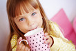 Photo: Kid girl drinking milk Kid girl drinking milk
