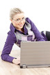 portrait of lying young businesswoman with a notebook
