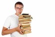 Young man  holding stack of books