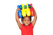 African little girl with with a bowling game on his head
