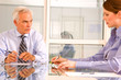 businessman and businesswoman during a working meeting