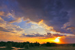 Beautiful sunrise and dramatic clouds on the sky. Flood waters o