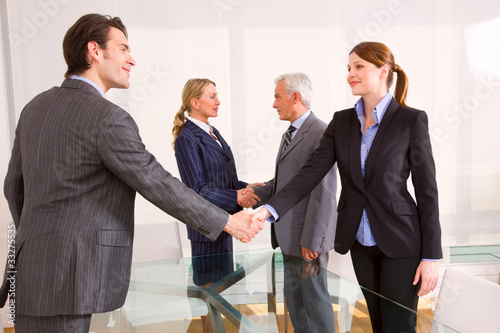 Photo: businessman and businesswoman during a working meeting businessman and businesswoman during a working meeting
