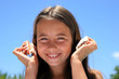 beautiful girl with shell at the beach in Summer vacation