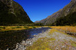 River flowing through Milford Sound